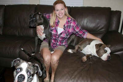 Tiffany Jolley and her three, lovable pit bulls.